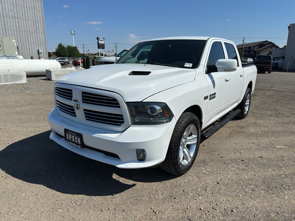 2015 RAM 1500 Sport in Bright White — front three-quarter view