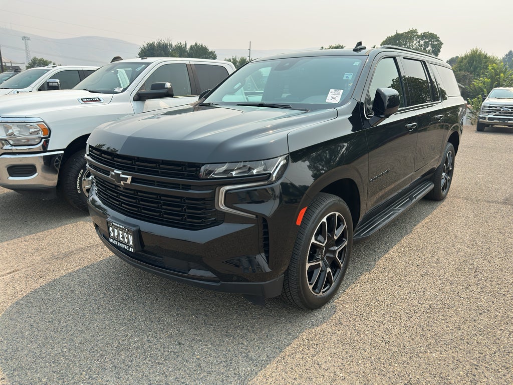 2024 Chevrolet Suburban RST in Black — front three-quarter view
