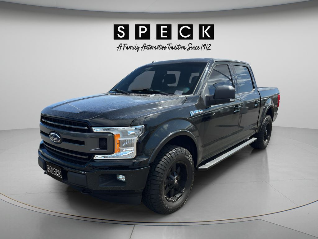2018 Ford F-150 XLT in Black — front three-quarter view
