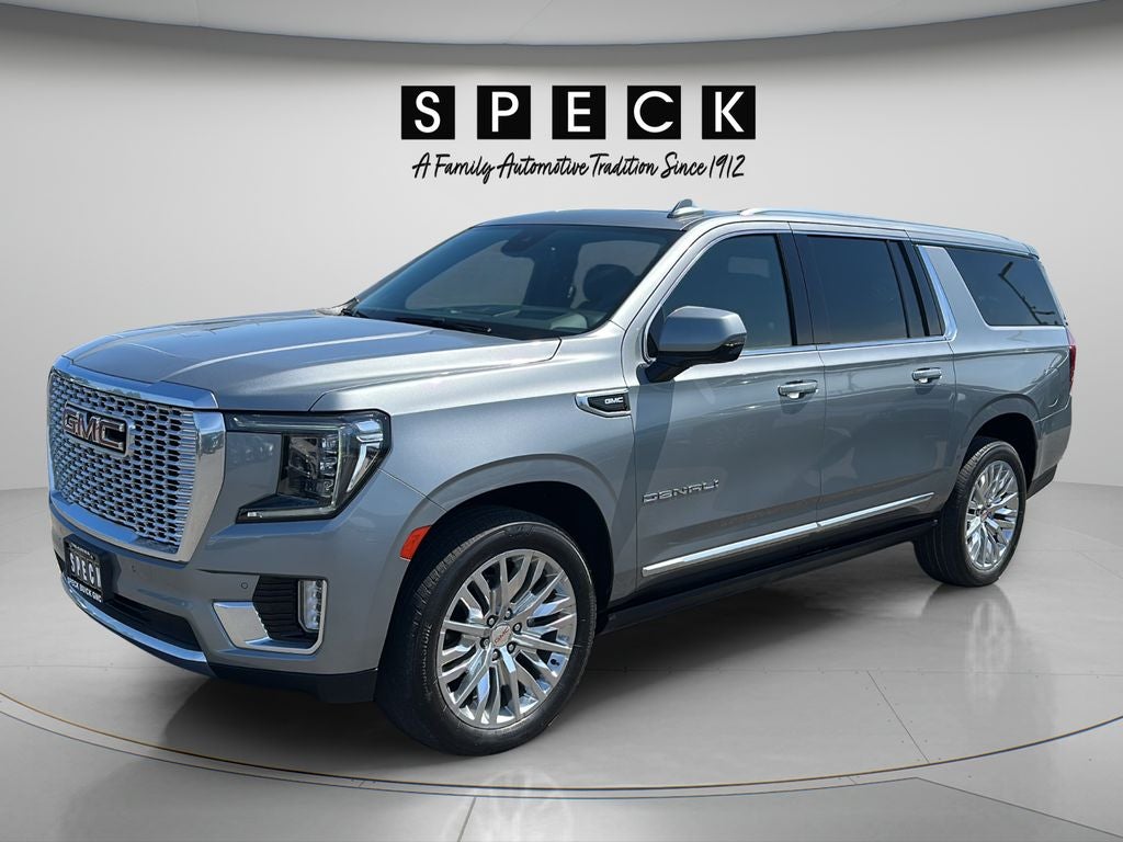 2023 GMC Yukon XL Denali in Sterling Metallic — front three-quarter view