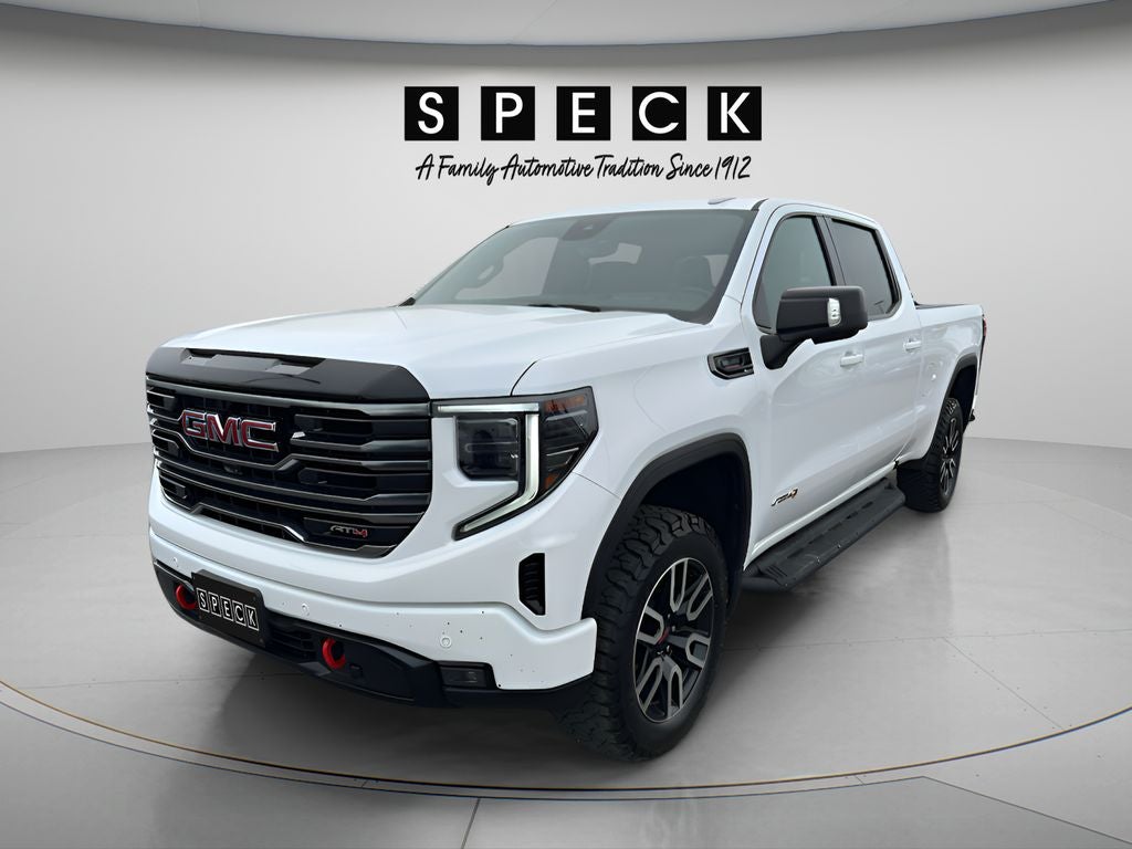 2025 GMC Sierra 1500 AT4 in Summit White — front three-quarter view