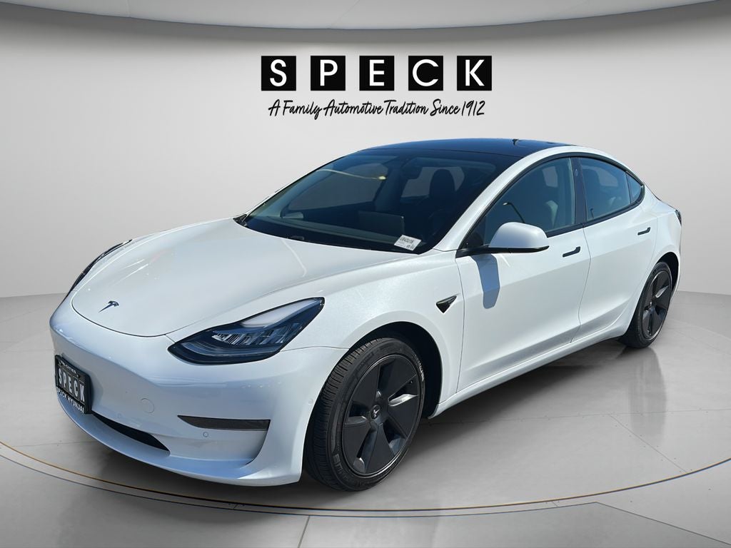 2021 Tesla Model 3 Standard Range Plus Rear-Wheel Drive in White — front three-quarter view