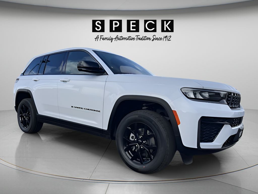 2026 Jeep Grand Cherokee GRAND CHEROKEE LAREDO ALTITUDE 4X4 in Bright White Clear-Coat Exterior Paint — front three-quarter view