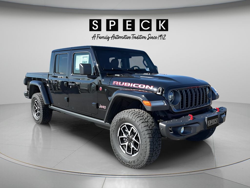 2026 Jeep Gladiator GLADIATOR RUBICON X 4X4 in Black Clear-Coat Exterior Paint — front three-quarter view