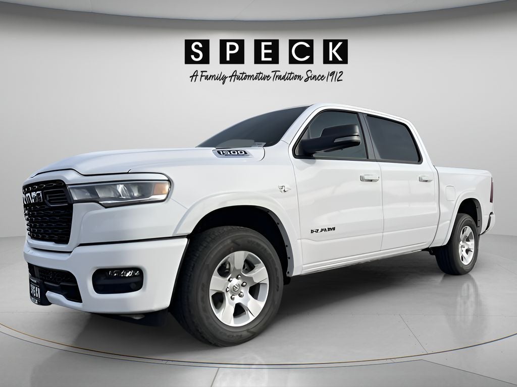 2026 RAM Ram 1500 RAM 1500 BIG HORN CREW CAB 4X4 5'7' BOX in Bright White Clear-Coat Exterior Paint — front three-quarter view