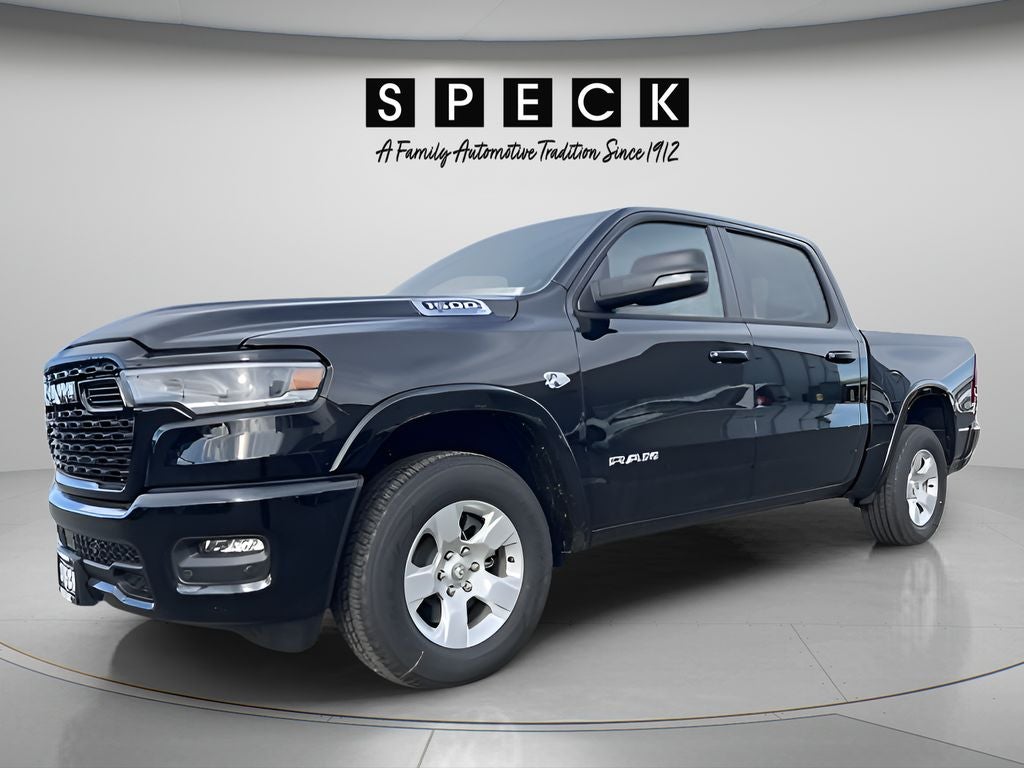 2026 RAM Ram 1500 RAM 1500 BIG HORN CREW CAB 4X4 5'7' BOX in Diamond Black Crystal Pearl-Coat Exterior Paint — front three-quarter view