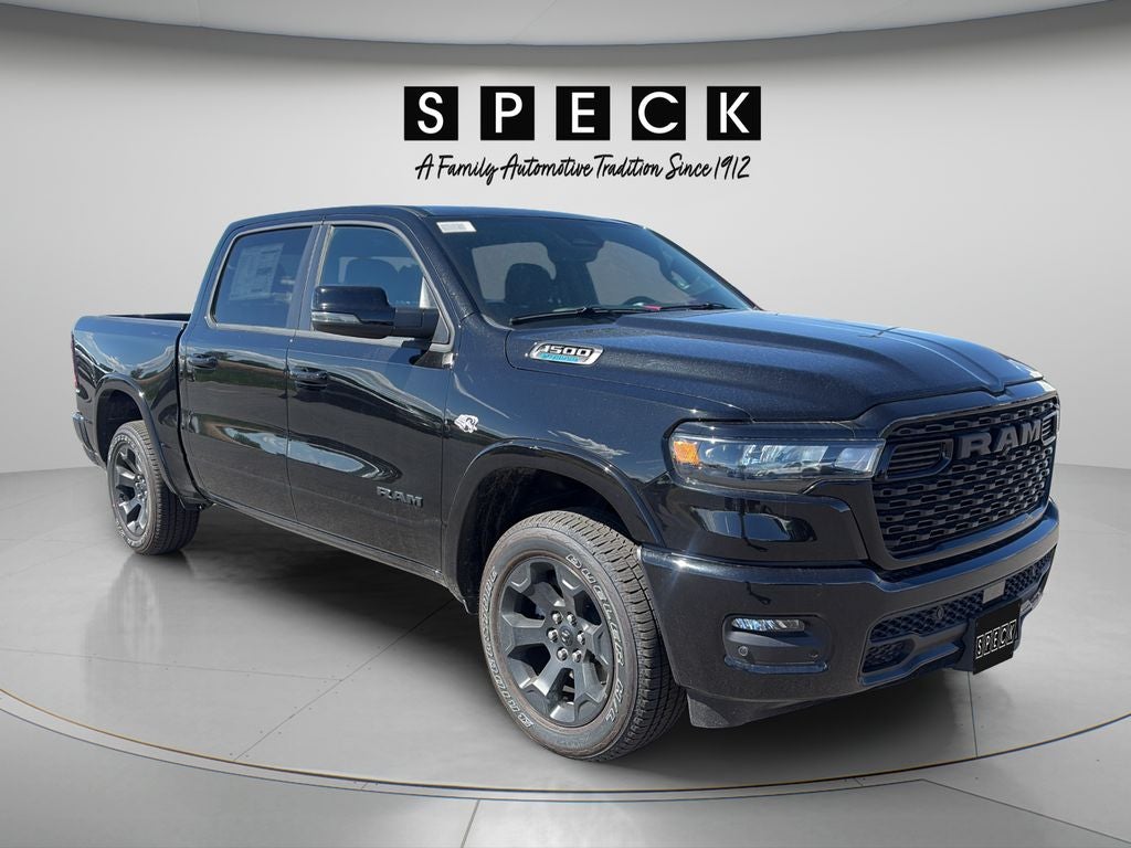 2026 RAM Ram 1500 RAM 1500 BIG HORN CREW CAB 4X4 5'7' BOX in Diamond Black Crystal Pearl-Coat Exterior Paint — front three-quarter view