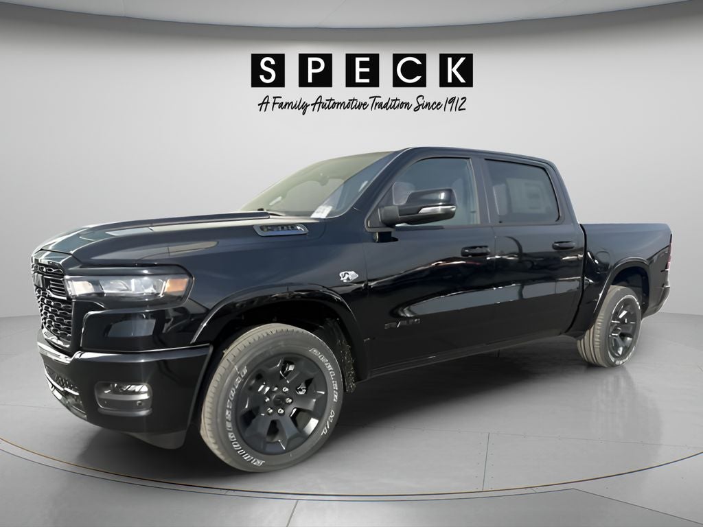 2026 RAM Ram 1500 RAM 1500 BIG HORN CREW CAB 4X4 5'7' BOX in Diamond Black Crystal Pearl-Coat Exterior Paint — front three-quarter view