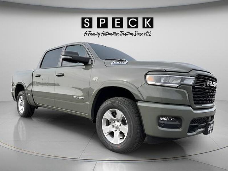 2026 RAM Ram 1500 RAM 1500 BIG HORN CREW CAB 4X4 5'7' BOX in Canyon Lake Exterior Paint — front three-quarter view