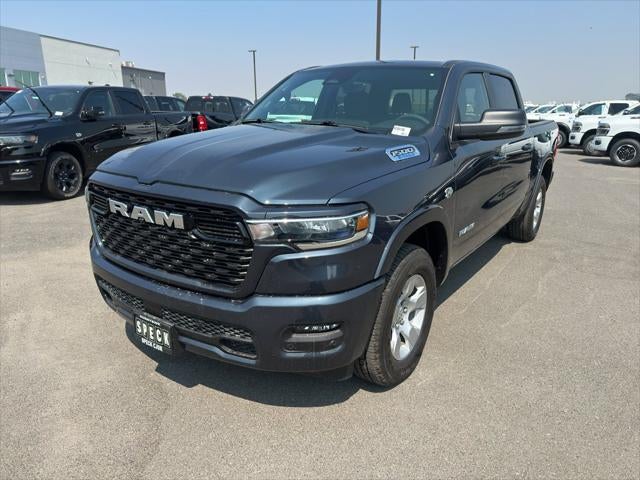2026 RAM Ram 1500 RAM 1500 BIG HORN CREW CAB 4X4 5'7' BOX in Forged Blue Metallic Exterior Paint — front three-quarter view