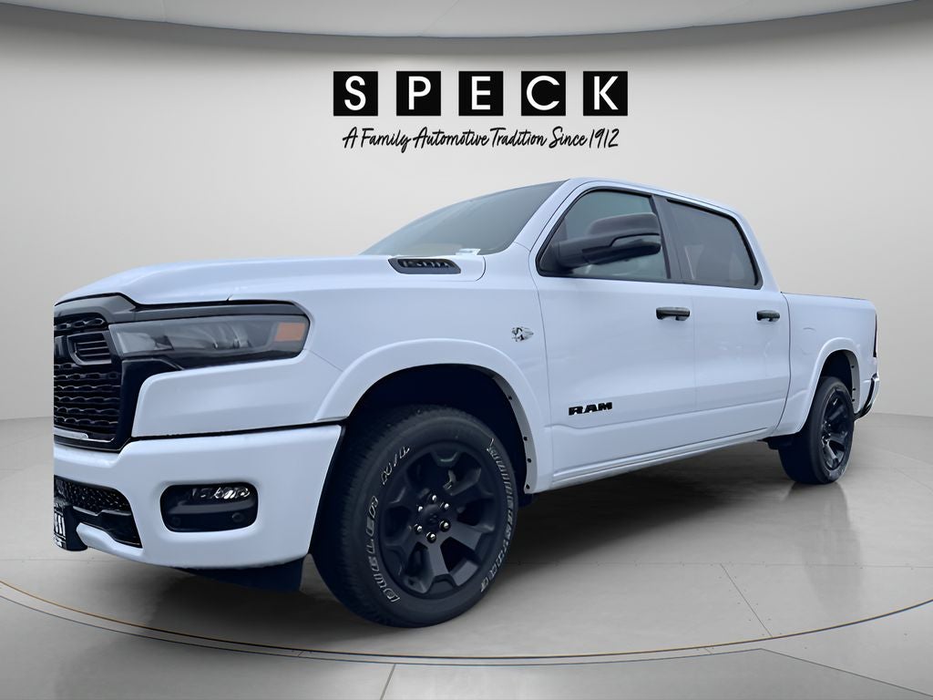 2026 RAM Ram 1500 RAM 1500 BIG HORN CREW CAB 4X4 5'7' BOX in Bright White Clear-Coat Exterior Paint — front three-quarter view