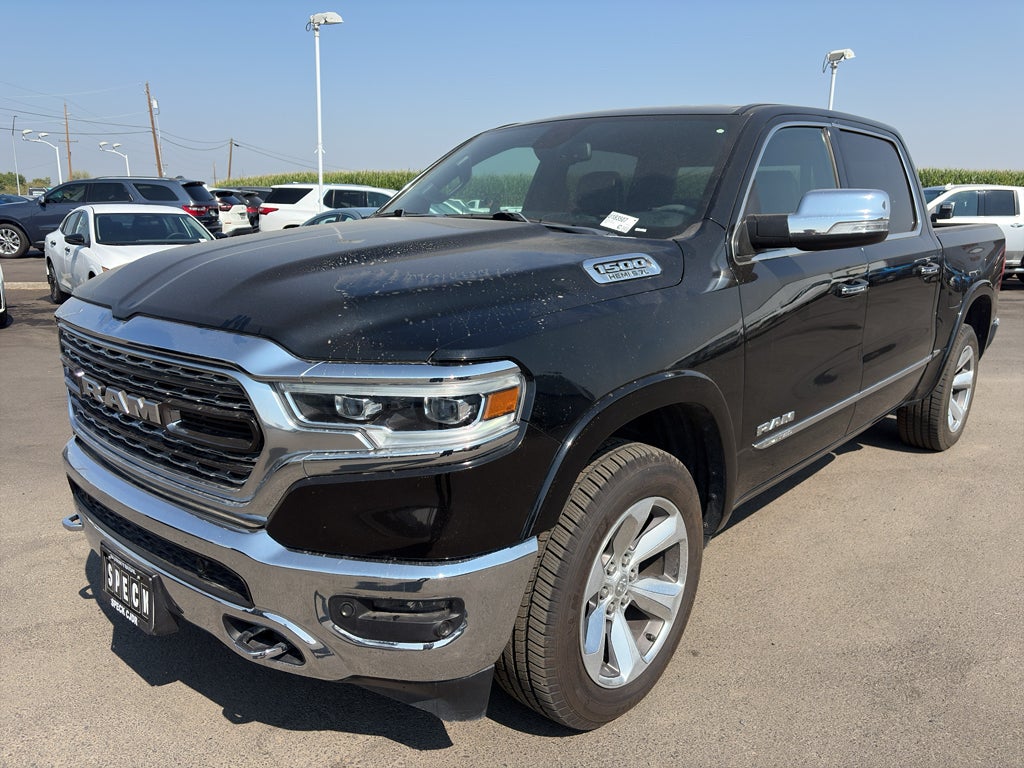 2020 RAM 1500 Limited Crew Cab 4x4 5'7' Box in Black — front three-quarter view