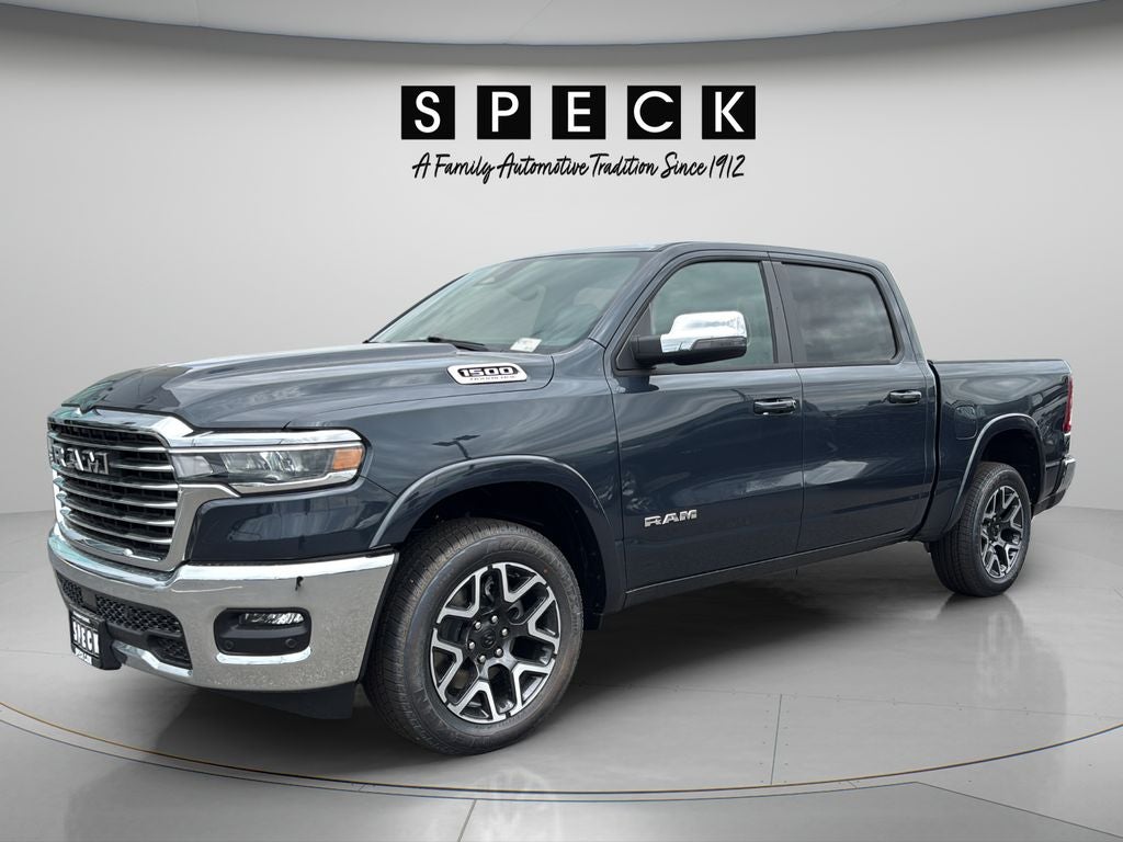 2026 RAM Ram 1500 RAM 1500 LARAMIE CREW CAB 4X4 5'7' BOX in Forged Blue Metallic Exterior Paint — front three-quarter view