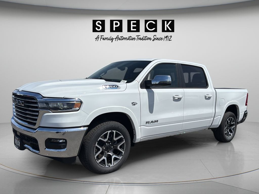 2026 RAM Ram 1500 RAM 1500 LARAMIE CREW CAB 4X4 5'7' BOX in Bright White Clear-Coat Exterior Paint — front three-quarter view