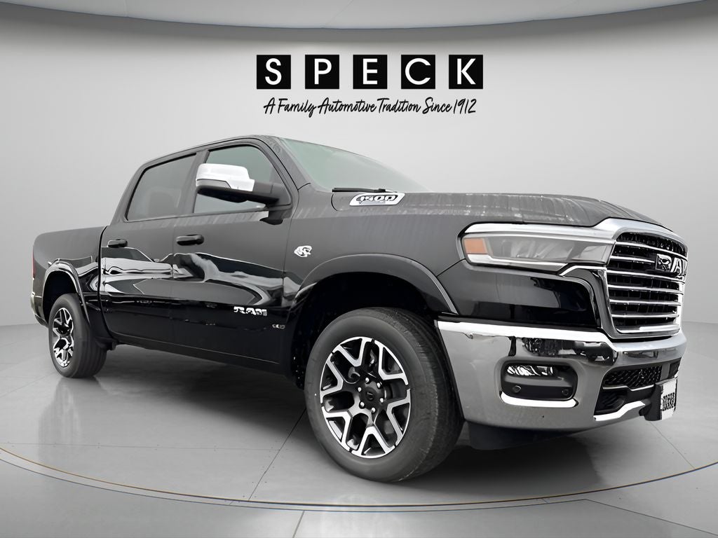 2026 RAM Ram 1500 RAM 1500 LARAMIE CREW CAB 4X4 5'7' BOX in Diamond Black Crystal Pearl-Coat Exterior Paint — front three-quarter view