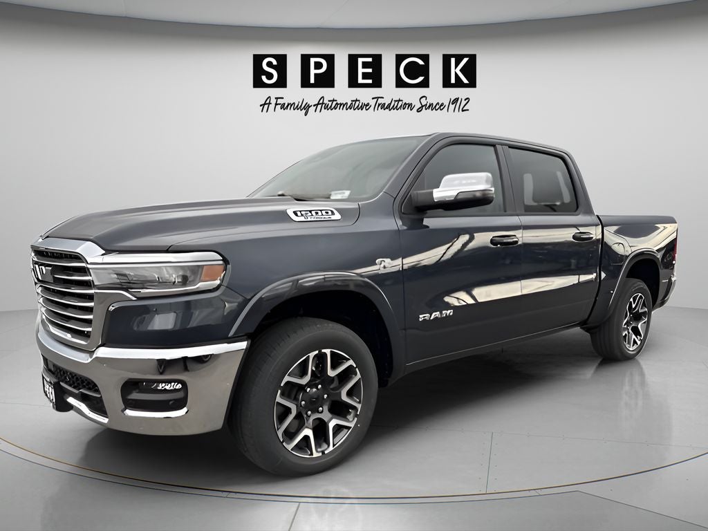 2026 RAM Ram 1500 RAM 1500 LARAMIE CREW CAB 4X4 5'7' BOX in Forged Blue Metallic Exterior Paint — front three-quarter view