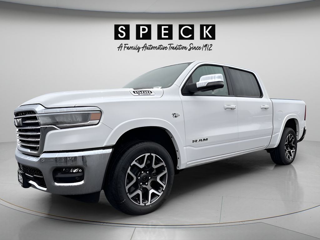 2026 RAM Ram 1500 RAM 1500 LARAMIE CREW CAB 4X4 5'7' BOX in Bright White Clear-Coat Exterior Paint — front three-quarter view