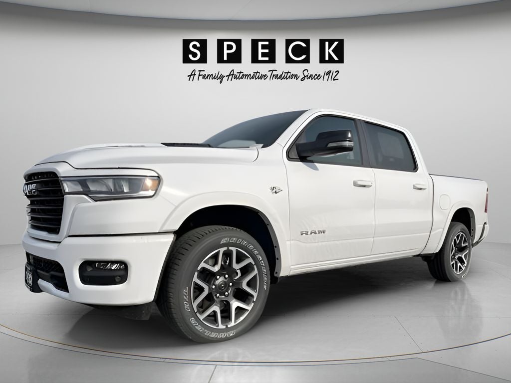 2026 RAM Ram 1500 RAM 1500 LARAMIE CREW CAB 4X4 5'7' BOX in Bright White Clear-Coat Exterior Paint — front three-quarter view