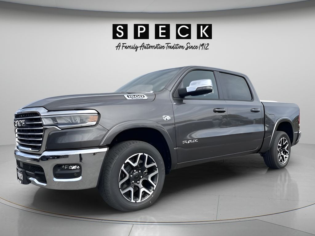 2026 RAM Ram 1500 RAM 1500 LARAMIE CREW CAB 4X4 5'7' BOX in Granite Crystal Metallic Clear-Coat Exterior Paint — front three-quarter view