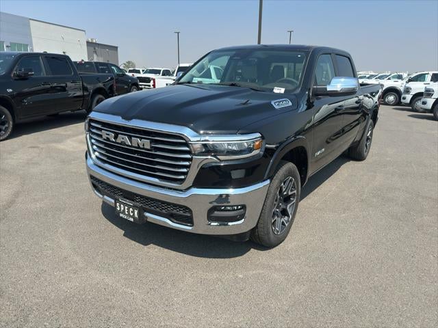 2026 RAM Ram 1500 RAM 1500 LARAMIE CREW CAB 4X4 6'4' BOX in Diamond Black Crystal Pearl-Coat Exterior Paint — front three-quarter view