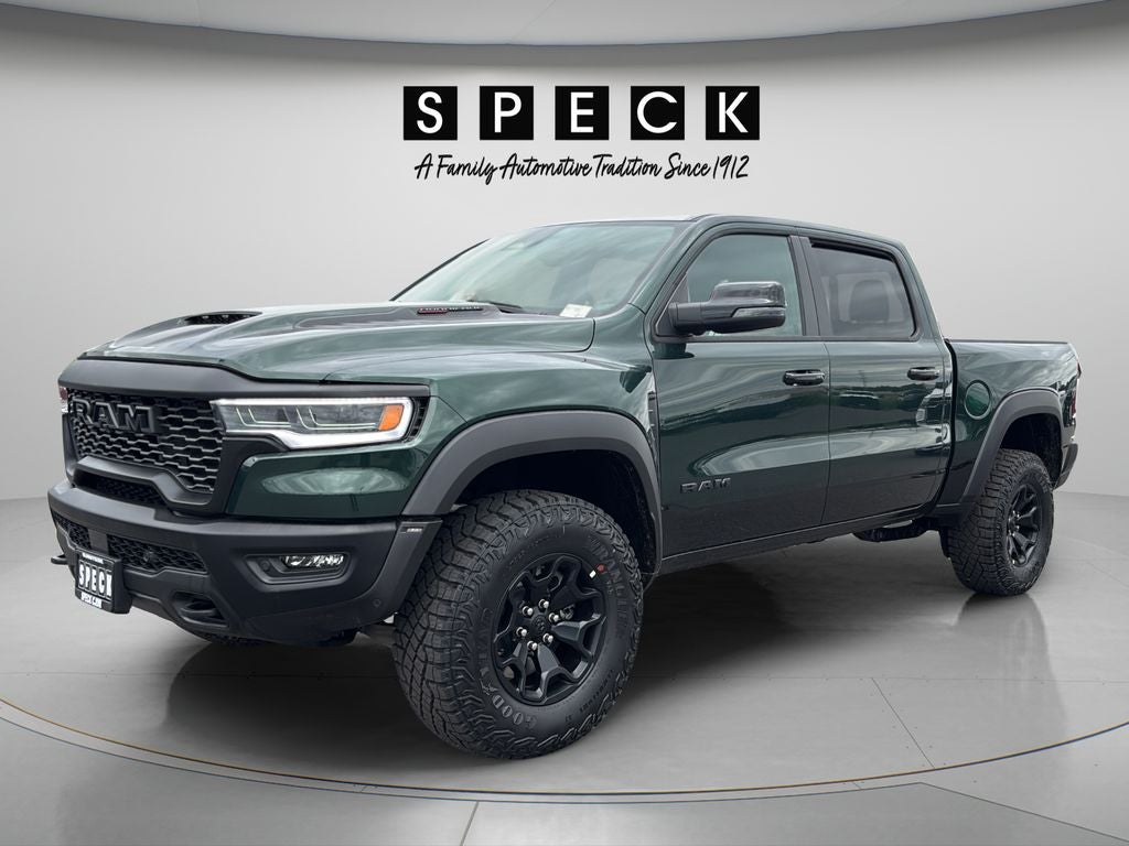 2026 RAM Ram 1500 RAM 1500 RHO CREW CAB 4X4 5'7' BOX in Serrano-Green Metallic Exterior Paint — front three-quarter view