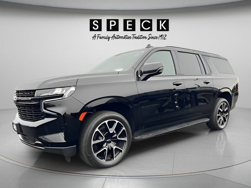 2024 Chevrolet Suburban 4WD RST in Black — front three-quarter view