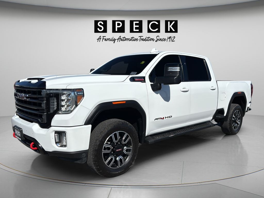 2022 GMC Sierra 2500HD 4WD Crew Cab Standard Bed AT4 in Summit White — front three-quarter view