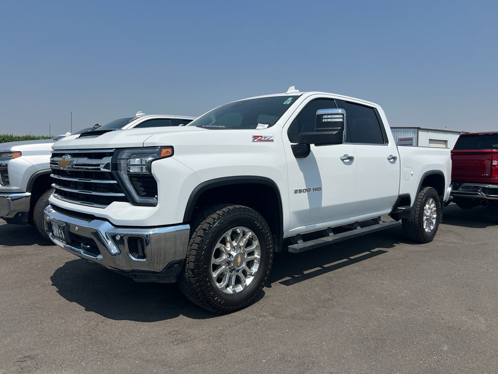 2025 Chevrolet Silverado 2500HD 4WD Crew Cab Standard Bed LTZ in Summit White — front three-quarter view