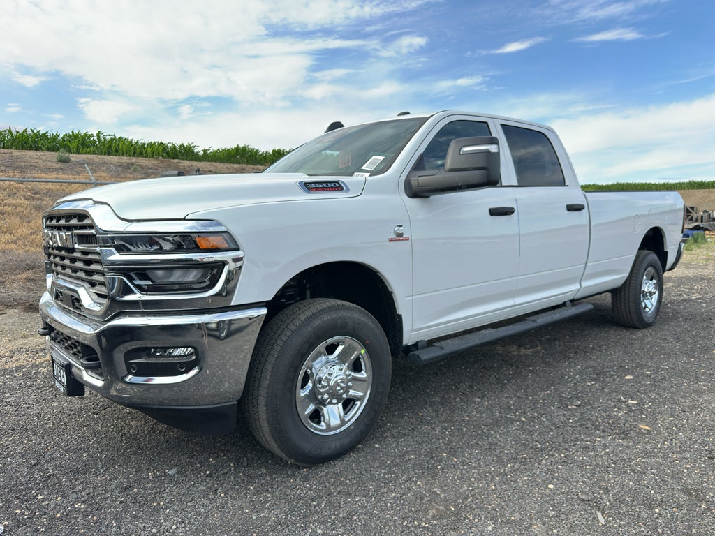 2026 RAM Ram 3500 RAM 3500 TRADESMAN CREW CAB 4X4 8' BOX in Bright White Clear-Coat Exterior Paint — front three-quarter view