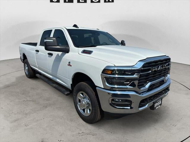 2026 RAM Ram 3500 RAM 3500 TRADESMAN CREW CAB 4X4 8' BOX in Bright White Clear-Coat Exterior Paint — front three-quarter view