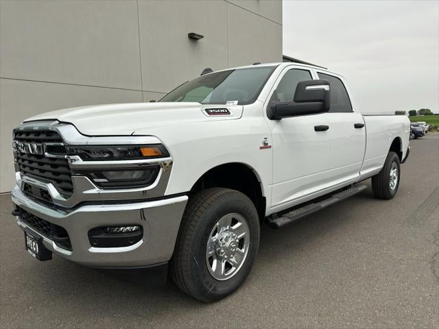2026 RAM Ram 3500 RAM 3500 TRADESMAN CREW CAB 4X4 8' BOX in Bright White Clear-Coat Exterior Paint — front three-quarter view