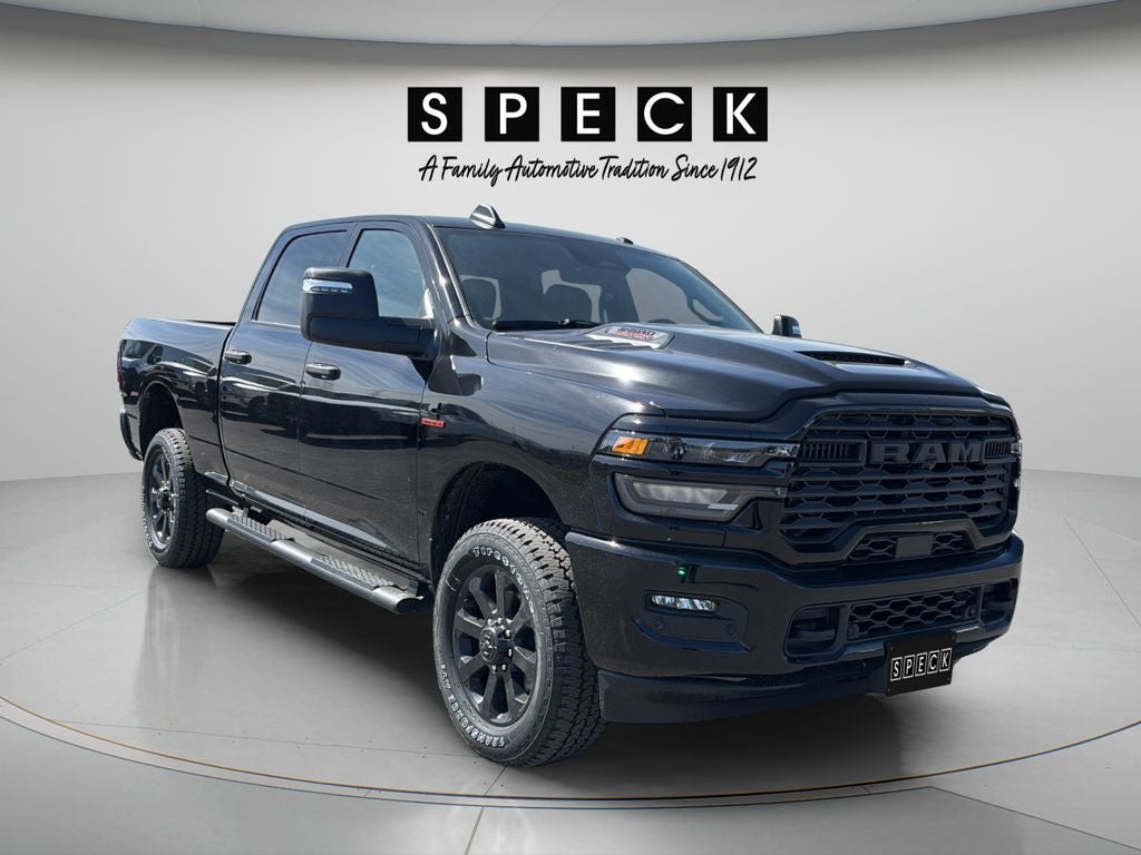 2026 RAM Ram 2500 RAM 2500 BLACK EXPRESS CREW CAB 4X4 6'4' BOX in Diamond Black Crystal Pearl-Coat Exterior Paint — front three-quarter view
