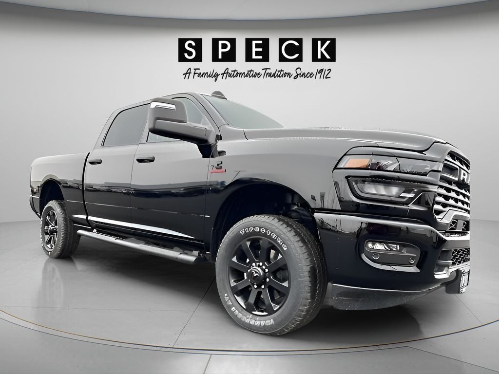 2026 RAM Ram 2500 RAM 2500 BLACK EXPRESS CREW CAB 4X4 6'4' BOX in Diamond Black Crystal Pearl-Coat Exterior Paint — front three-quarter view