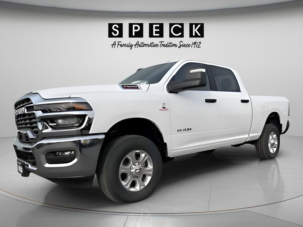 2026 RAM Ram 2500 RAM 2500 BIG HORN CREW CAB 4X4 6'4' BOX in Bright White Clear-Coat Exterior Paint — front three-quarter view