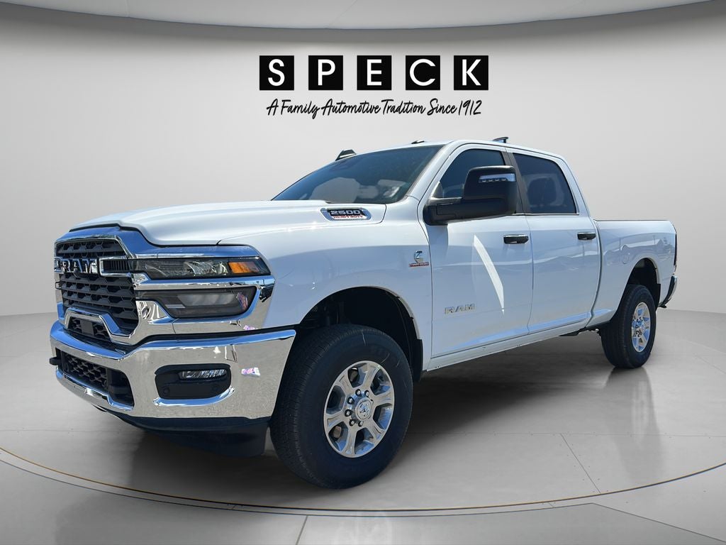 2026 RAM Ram 2500 RAM 2500 BIG HORN CREW CAB 4X4 6'4' BOX in Bright White Clear-Coat Exterior Paint — front three-quarter view