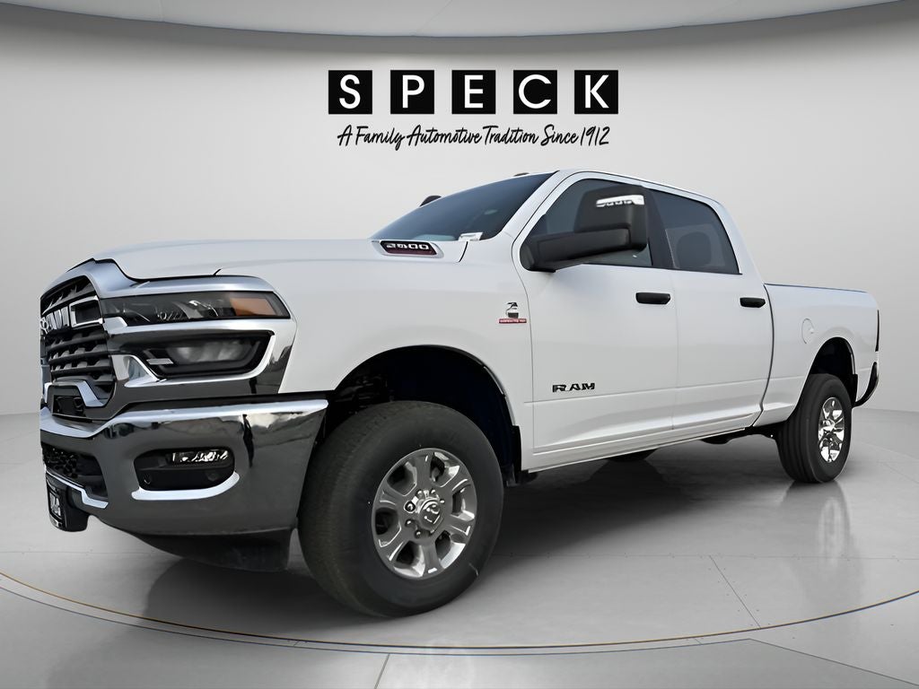 2026 RAM Ram 2500 RAM 2500 BIG HORN CREW CAB 4X4 6'4' BOX in Bright White Clear-Coat Exterior Paint — front three-quarter view
