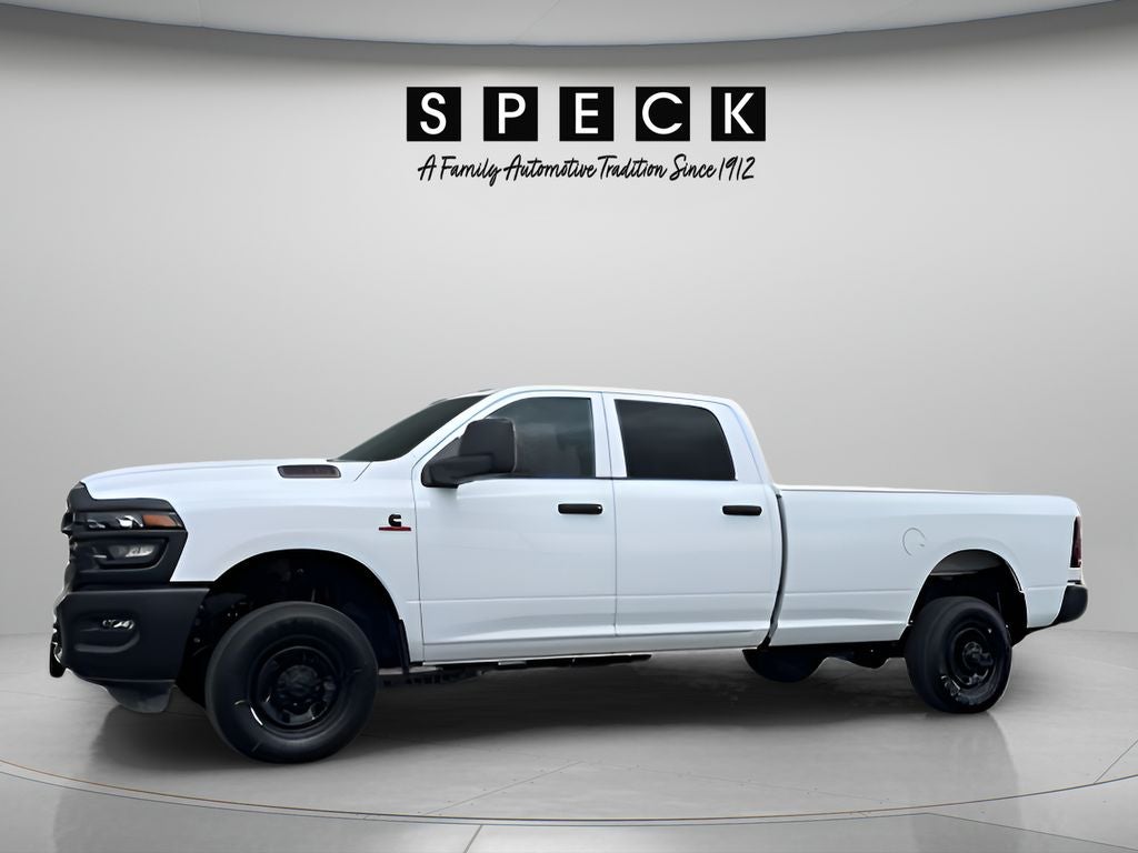2025 RAM Ram 2500 RAM 2500 TRADESMAN CREW CAB 4X4 8' BOX in Bright White Clear-Coat Exterior Paint — front three-quarter view