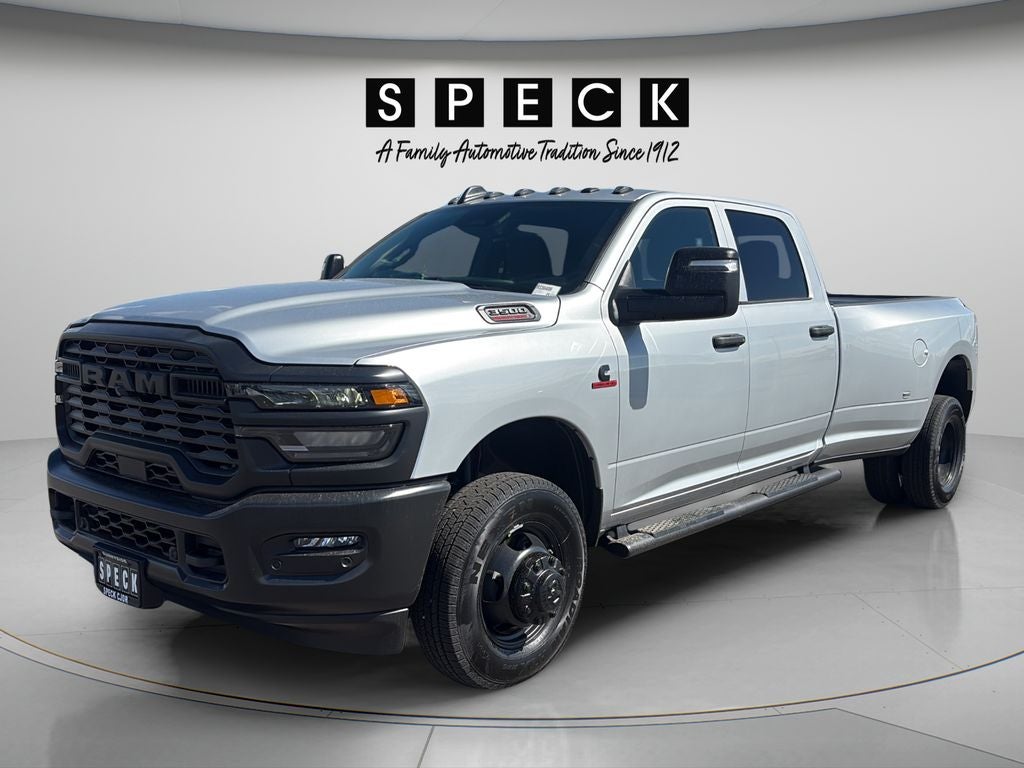 2026 RAM Ram 3500 RAM 3500 TRADESMAN CREW CAB 4X4 8' BOX in Silver-Zynith Exterior Paint — front three-quarter view