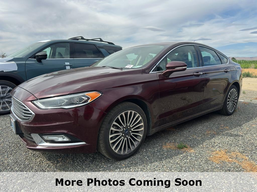 2017 Ford Fusion SE in Burgundy Velvet Metallic Tinted Clearcoat — front three-quarter view